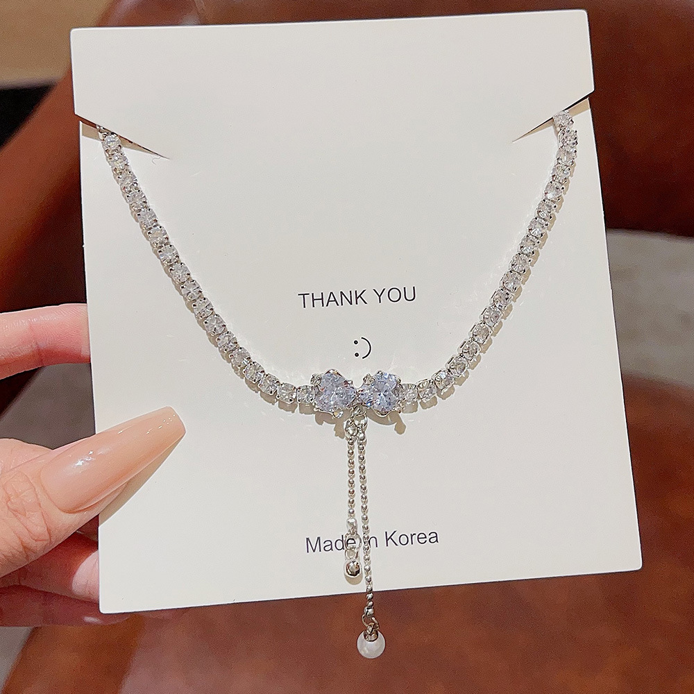 Bow pearl necklace, a versatile, light luxury and niche design for women, a new high-end neckchain and collarbone chain accessory from Yiwu details Picture