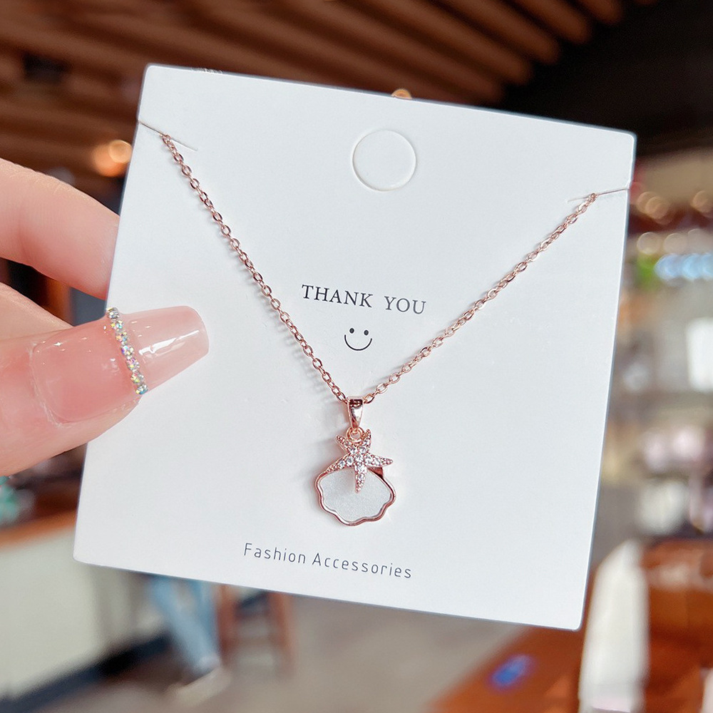 New Japanese and Korean starfish shell titanium steel necklace for women, wholesale, light luxury, niche and ethereal neckchain, elegant collarbone chain full figure