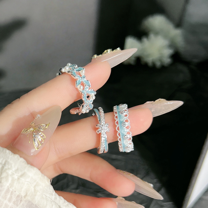 The 2025 bestseller blue enamel dynamic butterfly ring, a gentle and versatile silver-white ring with a cold feminine style full figure