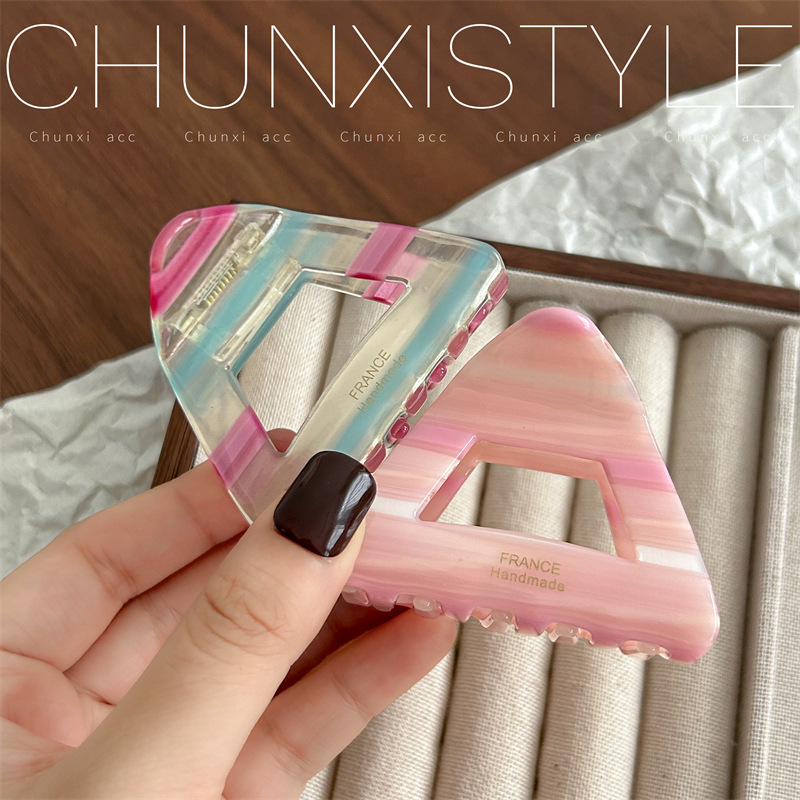 Ice cream striped acetate triangular gripper, niche design shark clip, back head plate hair clip, semi-tied hair claw hair accessory Application Scenario
