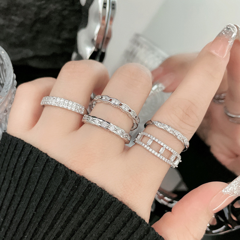 This simple and slightly inlaid zircon small ring is suitable for women to adjust their temperament and exude a sense of high-end sophistication. It features a light luxury and niche design with a cold style details Picture