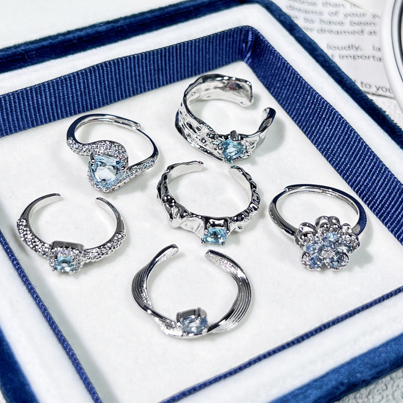 Korean-style high-end, light luxury, sea blue zircon, exquisite flower heart, fashionable ring, cold female style, niche ring trend Specification drawing