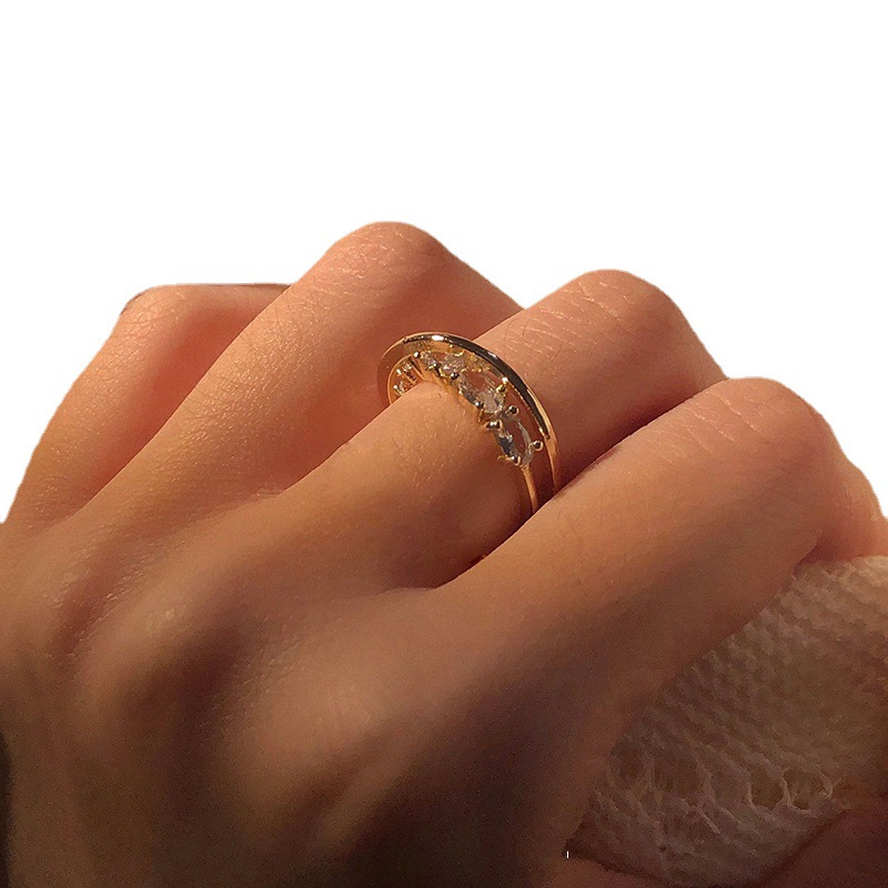 A niche design of a light luxury layered ring for women on Instagram, with a cold style and a high-end feel. It's versatile and set with zircon, featuring an open food ring Item Picture
