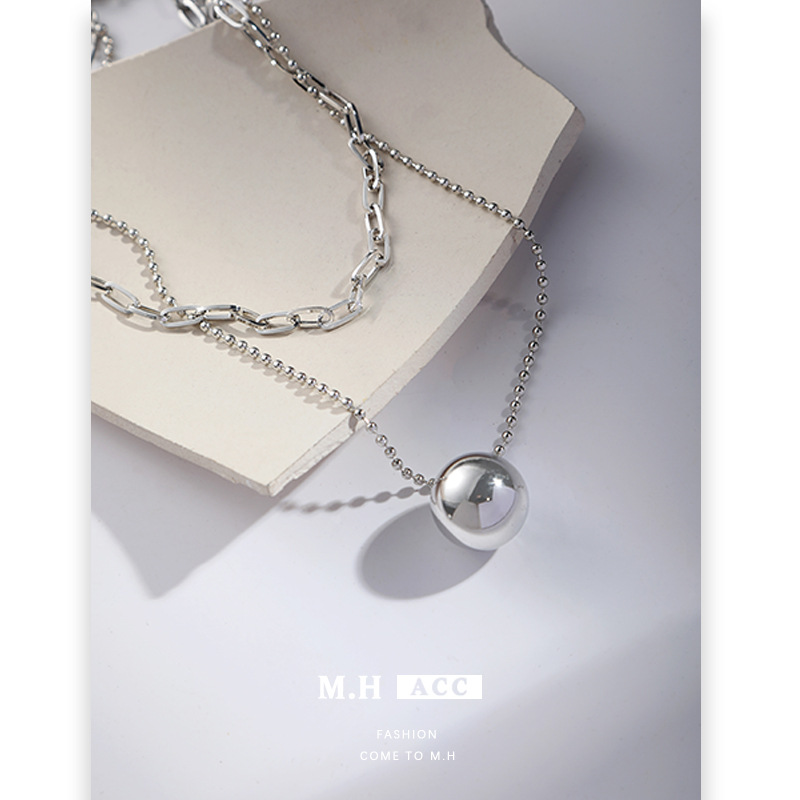 The simple style round bead stacked necklace is a fashionable and versatile cross-border accessory for women. The sweater chain is unique and individualistic full figure