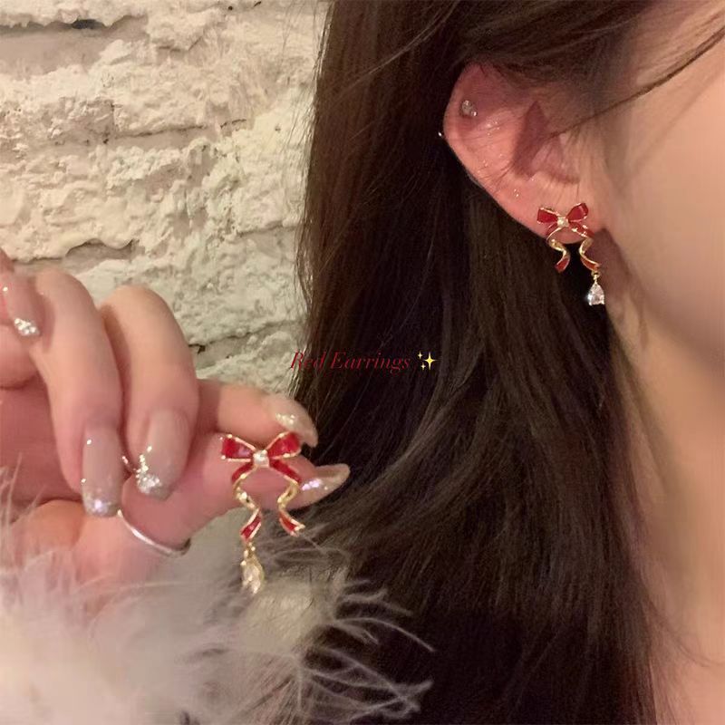 Autumn and winter New Year red bow ribbon earrings, zircon stud earrings for women, light luxury and high-end earrings wholesale Application Scenario