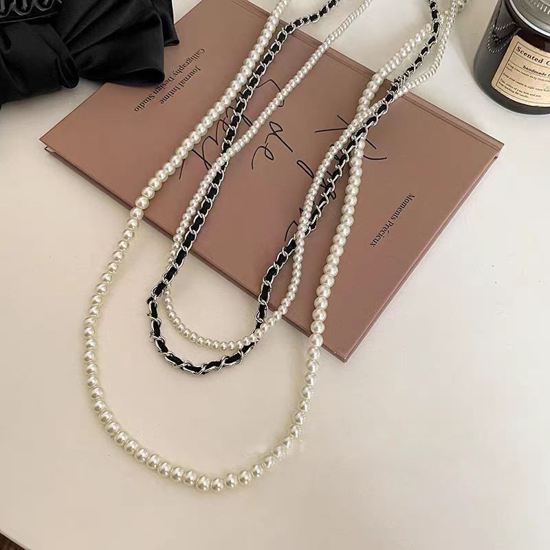 Shijia pearl leather multi-layer necklaces, fashionable and elegant sweater chains, retro, niche and versatile accessories wholesale details Picture