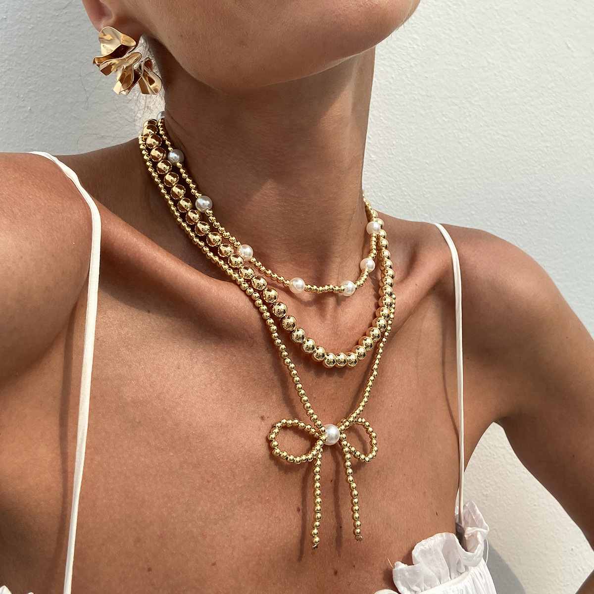 European and American cross-border jewelry, Bohemian CCB bow pendant necklace, retro imitation pearl beaded collarbone chain Specification drawing