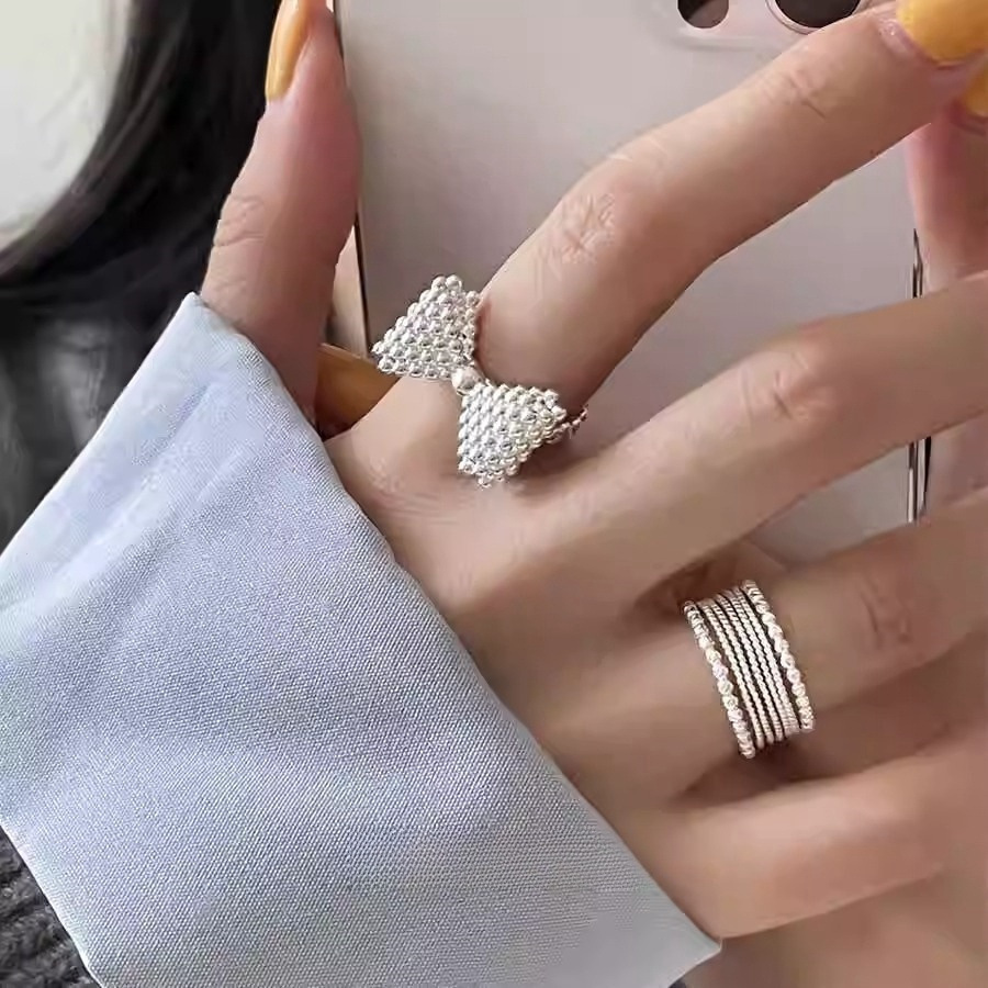 Korean bubble three-dimensional bow ring for women, S925 silver, light luxury, niche and high-end, fashionable open index finger ring full figure