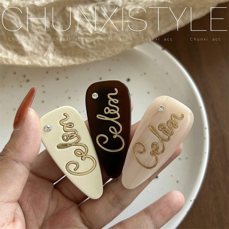 Retro chocolate milk candy, sweet and girlish French letter acetate hair clip, niche fashion, side bangs clip for girls Application Scenario