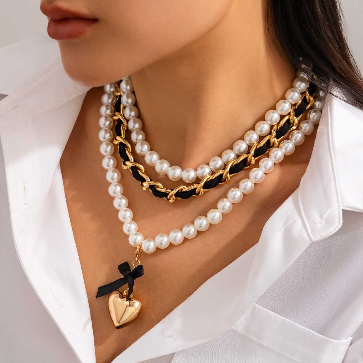 European and American cross-border jewelry fashion pearl ribbon beaded Necklace high-end heart pendant Necklace set full figure