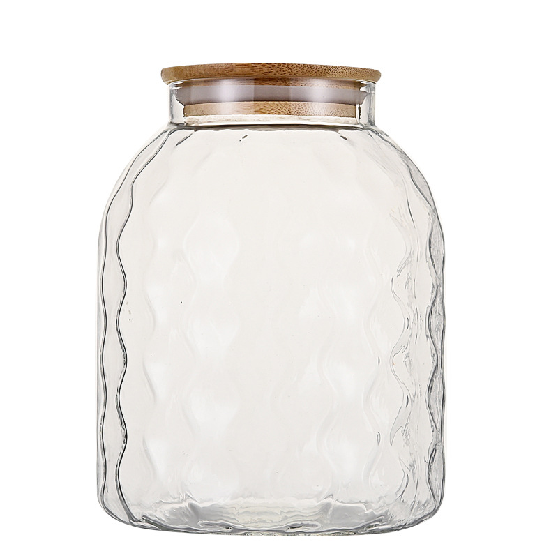 Wholesale tangerine peel storage jars, household large-diameter round transparent glass storage jars, thickened five-grain and miscellaneous grain storage jars Item Picture