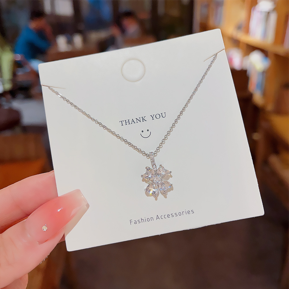 Micro-inlaid zircon flower titanium steel necklace for women, trendy and niche design sense, light luxury pendant, versatile collarbone chain wholesale details Picture