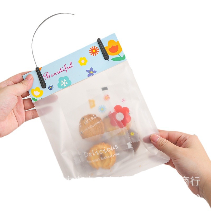 Wholesale of snowflake pastry packaging bags, nougat cookies, machine sealed bags, frosted cookies, baking packaging, self-standing hand-held bags Item Picture