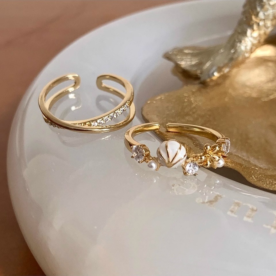 The niche design of the shell zircon ring for women exudes a sense of light luxury and sophistication. It is a gentle and versatile open-ring trend Application Scenario