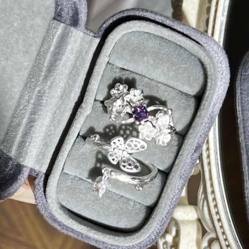 The new light luxury star wreath is exquisitely silver-plated, frosted purple diamond flower ring with hollowed-out butterfly tassels, exuding a refined charm Application Scenario