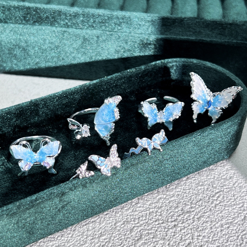 The trendy liquid butterfly fashion glacier lake blue fine sparkling drop glaze open ring is a simple, sweet and cool atmosphere ring for women Specification drawing