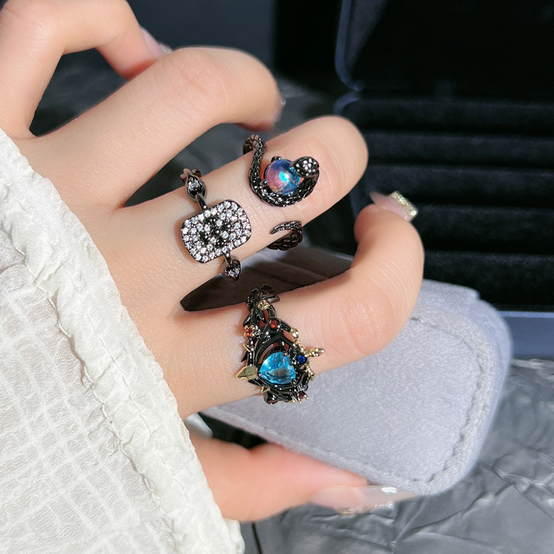 Dark punk-style iris flower slightly inlaid with heart, sea blue zircon fashion ring, female hip-hop moonstone snake-shaped ring details Picture