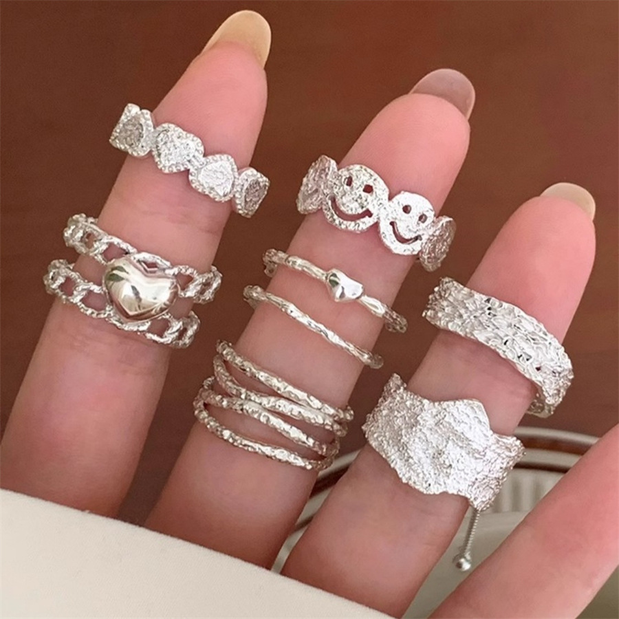 Irregular texture smiling heart ring, women's open index finger ring, cold style, simple and niche design sense ring full figure