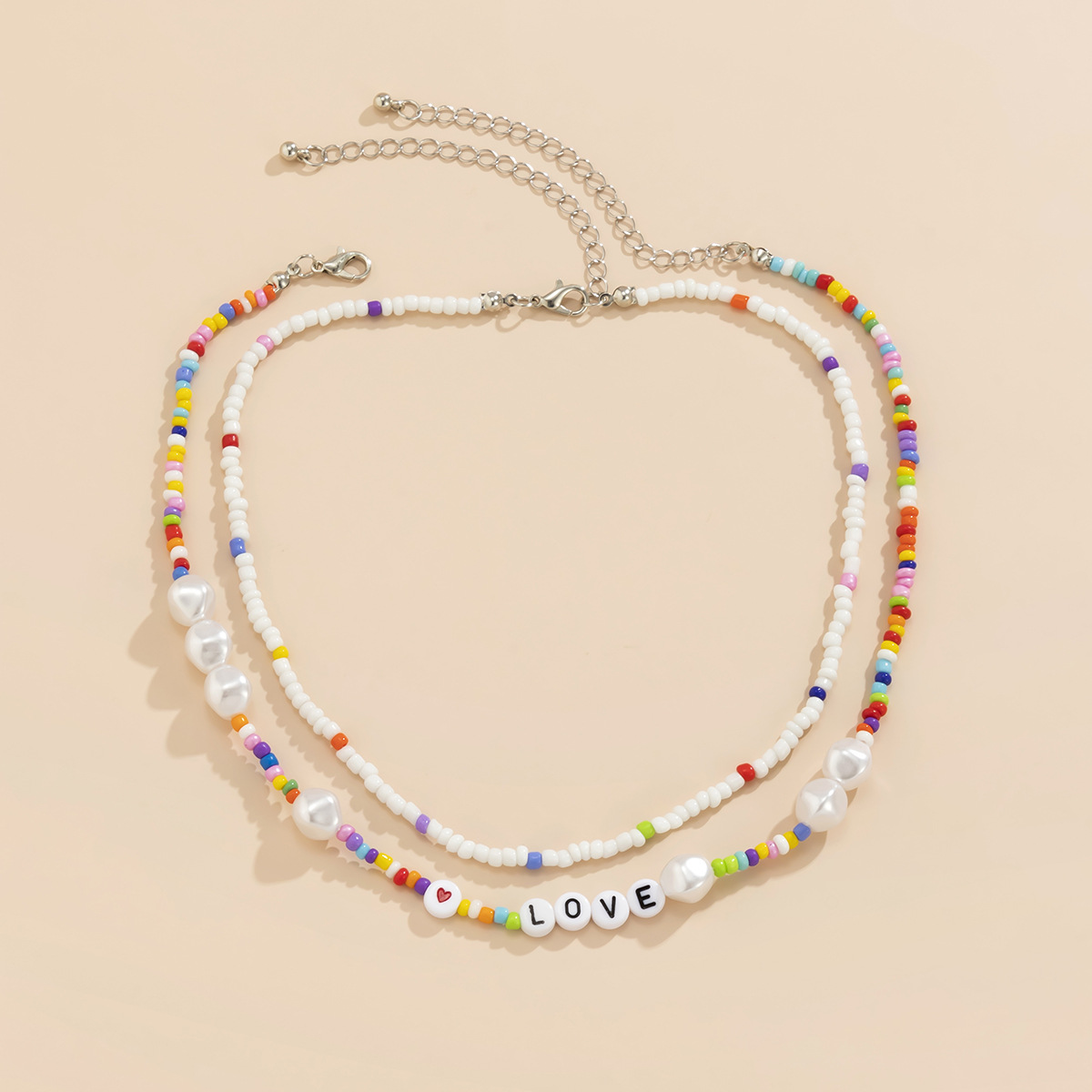 Retro mixed color patchwork imitation pearl collarbone chain, European and American creative acrylic letter rice bead woven necklace details Picture