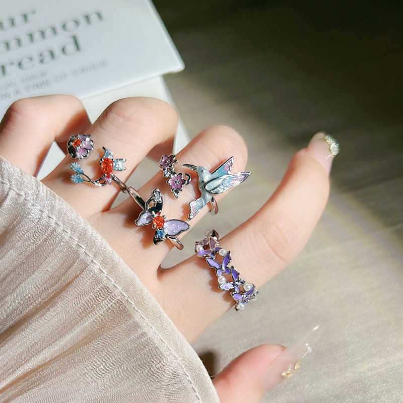 A dynamic and ethereal three-dimensional colorful bird ring for women, a creative and unique sweet and cool butterfly ring with a niche and cold style Specification drawing