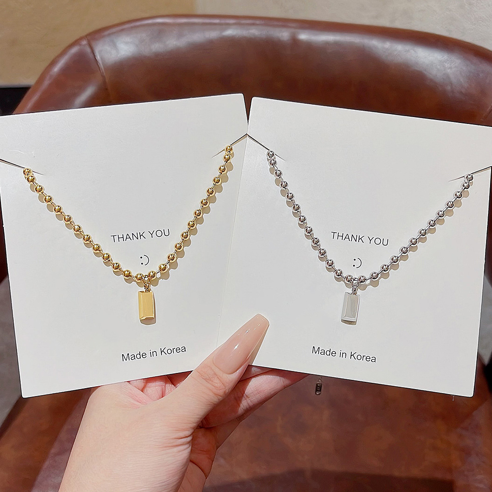 The "Get Rich Quickly" small gold brick necklace does not fade. It is a light luxury titanium steel small gold bar square pendant with a stylish and versatile collarbone chain accessory Specification drawing
