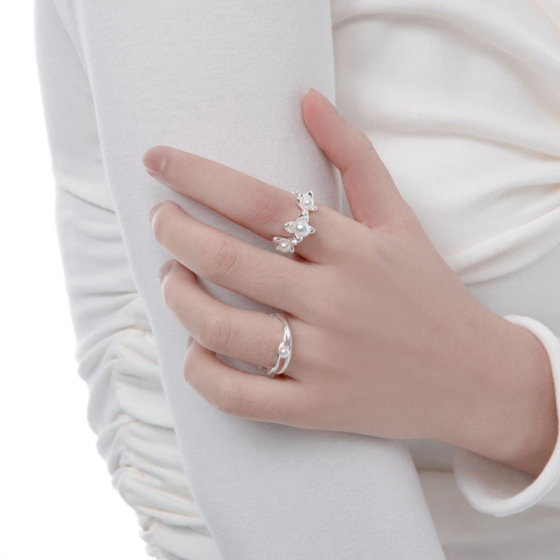 A niche design with a high-end pearl opening ring, a women's hollowed-out ins light luxury fashion cold style butterfly index finger ring Specification drawing