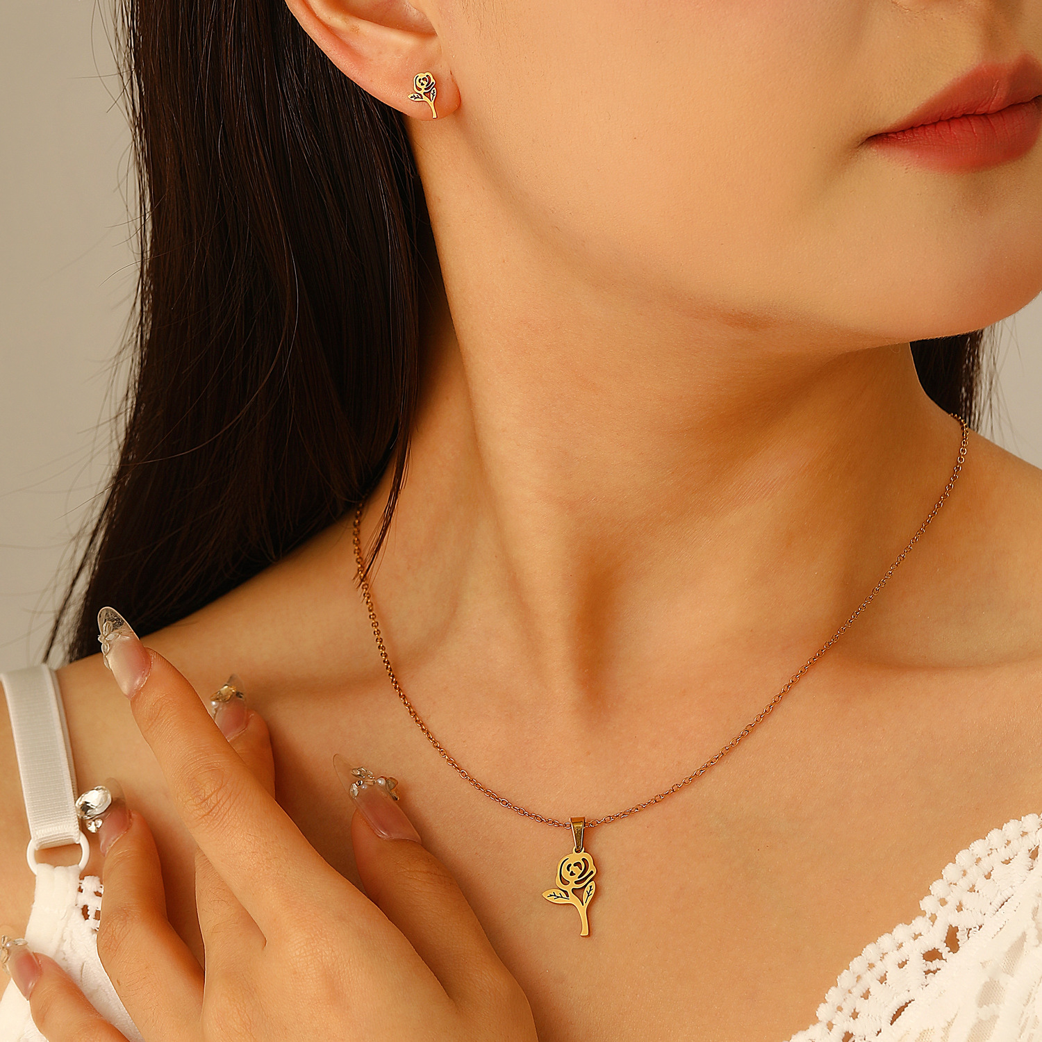 European and American stainless steel earrings and necklaces set, cross-border hollowed-out rose stud earrings and necklaces, simple spring and summer accessories for women details Picture