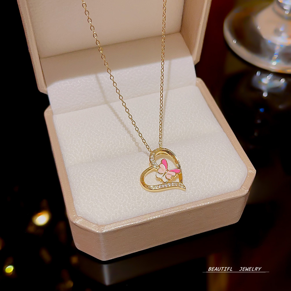Sweet and heart-shaped necklace, a niche design for women, colorful butterfly pendant, collarbone chain, new 2024 sweater chain accessory full figure