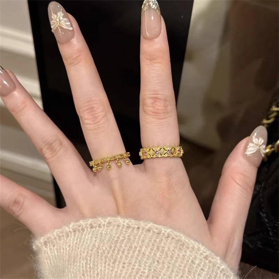 A new mid-style hollowed-out lace rattle tassel ring for women with a light luxury and niche design, exuding a sense of high-end elegance Application Scenario