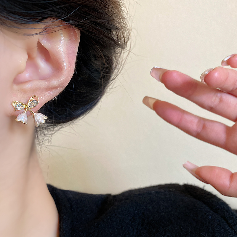 Korean-style lily of the valley bow earrings for women in spring, a unique and versatile style, zircon stud earrings, a best-selling accessory wholesale Application Scenario