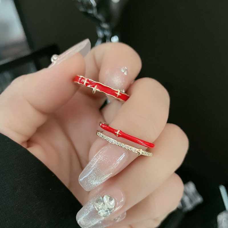 Double-layer red star-shaped hollowed-out ring, a niche design for women. Adjustable ring for the zodiac year, a personalized index finger ring Application Scenario