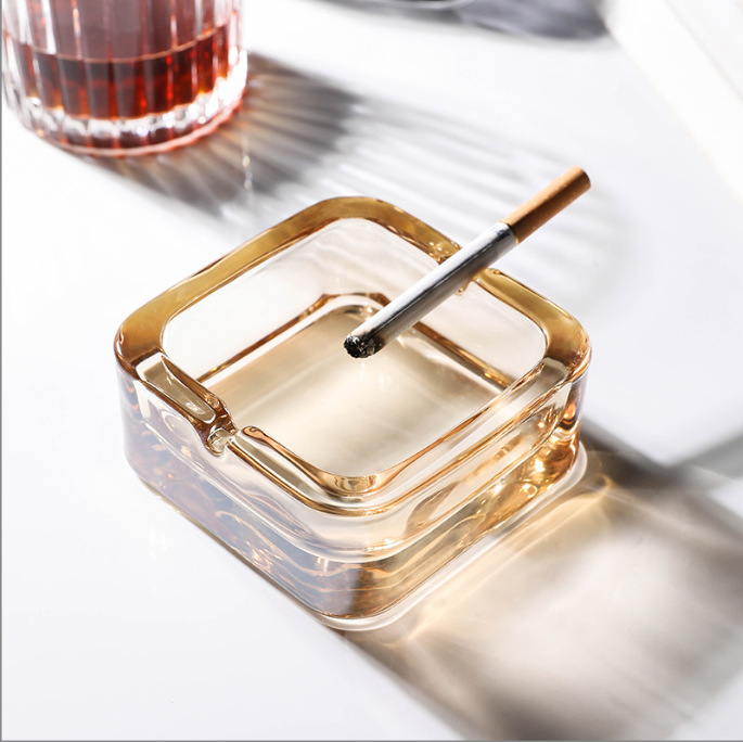 A small, exquisite and fashionable square ashtray made of crystal glass for home use, a light luxury living room, a creative hotel, and a high-end ashtray details Picture