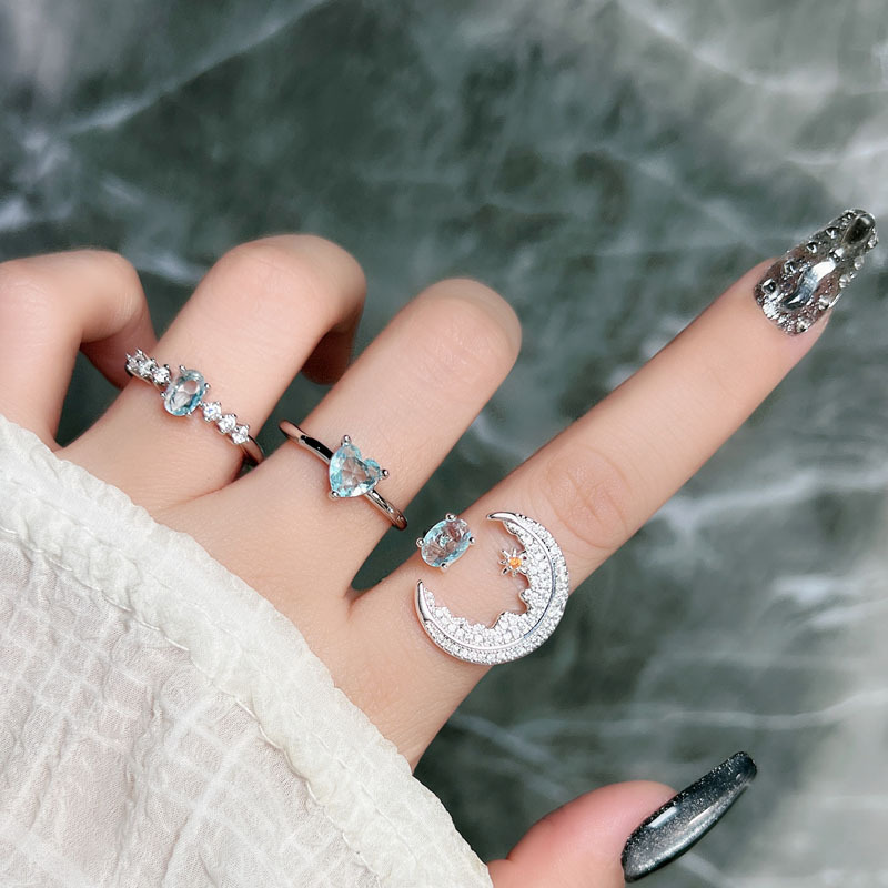 A simple and individual open ring with a blue diamond moon, a cold and fashionable style for women, and a unique and elegant index finger ring full figure