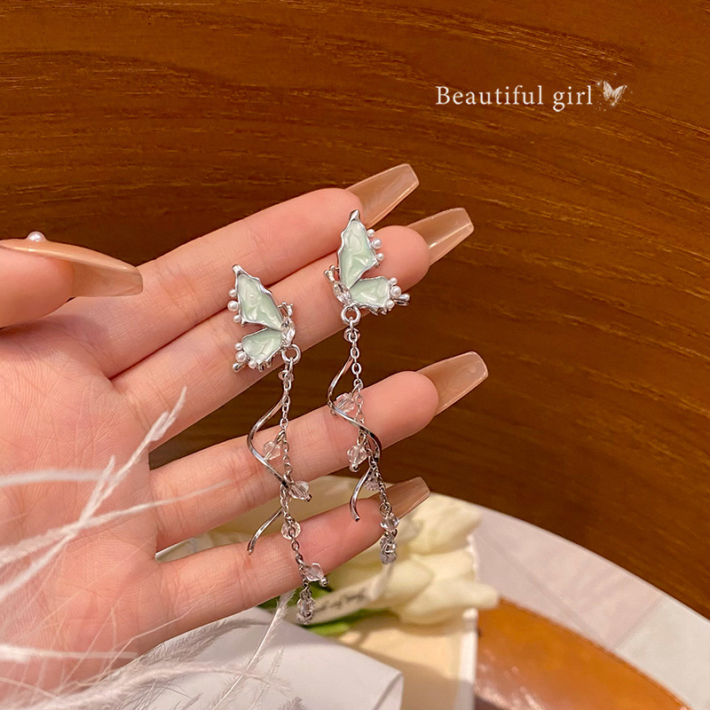 The super ethereal blue butterfly tassel earrings exude a sense of fashion and sophistication for women. The versatile pearl long stud earrings are best-selling earrings full figure