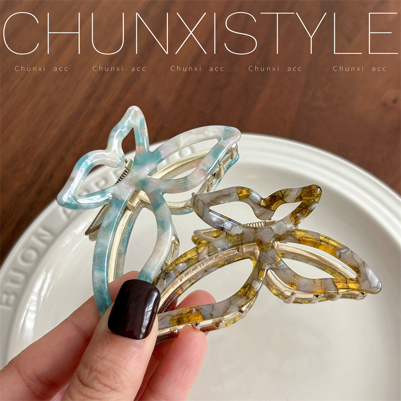 Mermaid Girl acetic acid butterfly hair clip, female back head updo hair clip, small, high-end shark clip hair clip headwear Application Scenario