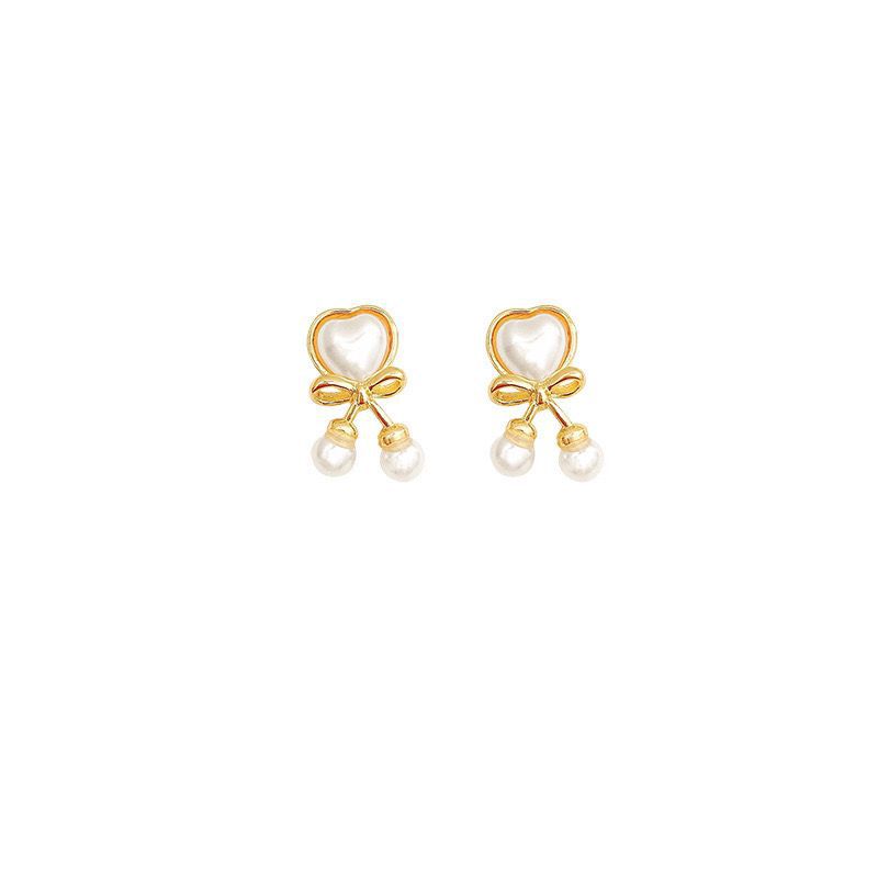 Autumn and winter bow heart-shaped cat's eye stone earrings for women, 2025 new trendy and fashionable earrings, high-end and light luxury stud earrings Item Picture