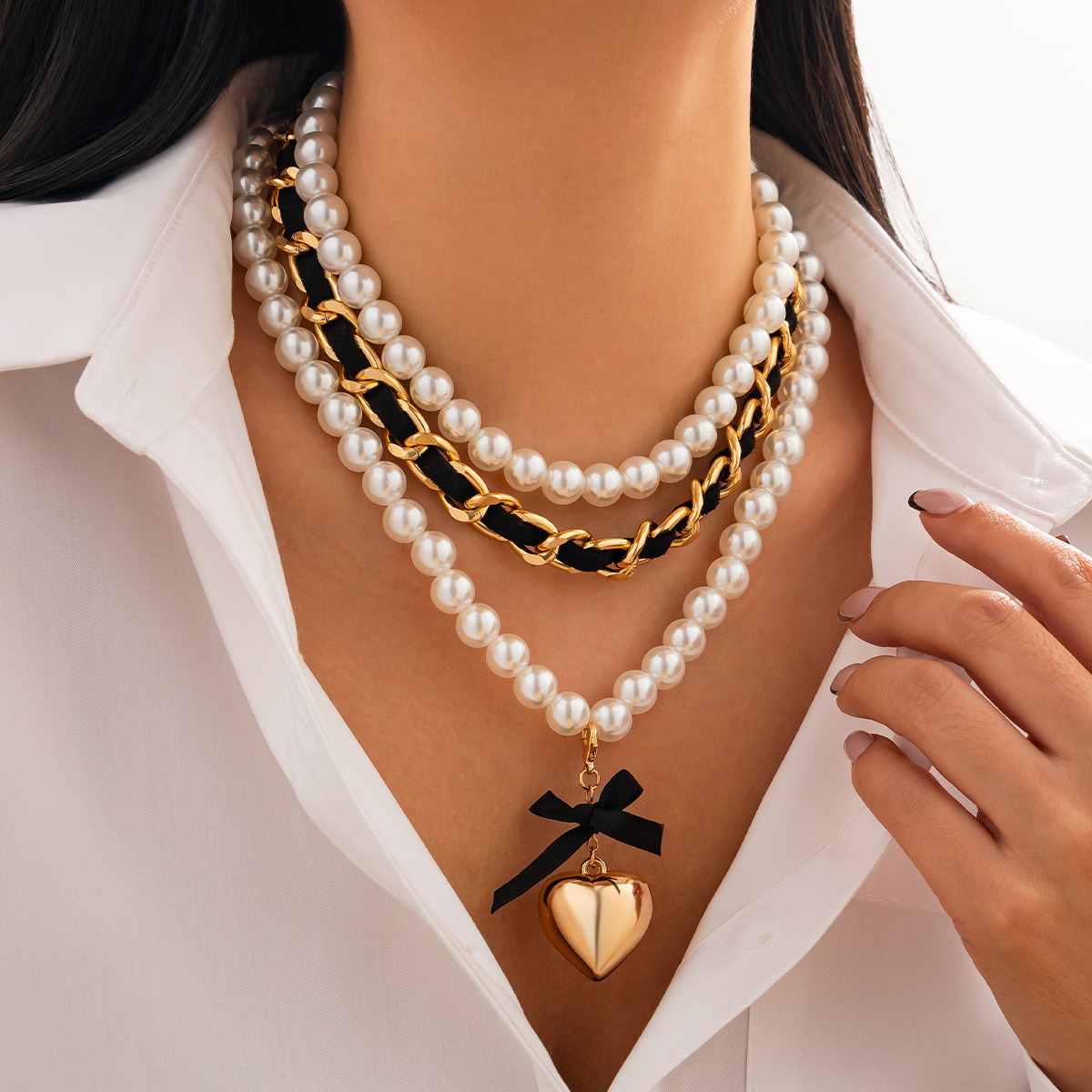 European and American cross-border jewelry fashion pearl ribbon beaded Necklace high-end heart pendant Necklace set details Picture