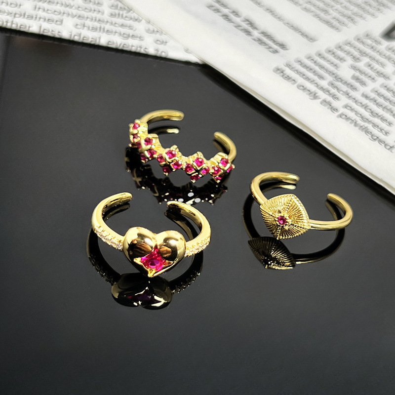 A niche, sweet and light luxury flower-shaped rose red zircon open ring, a noble and elegant female heart geometric brushed index finger ring Application Scenario
