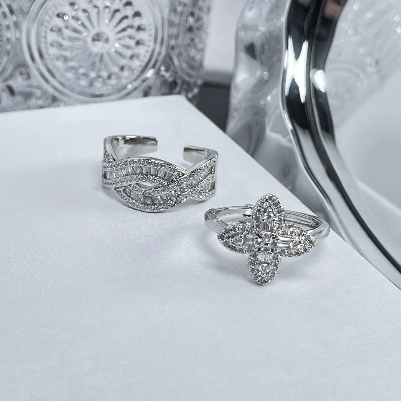 A light luxury, full diamond ladder, square row diamonds, cross-stacked open ring, a female four-leaf clover, elegant and high-end, cold style ring Application Scenario