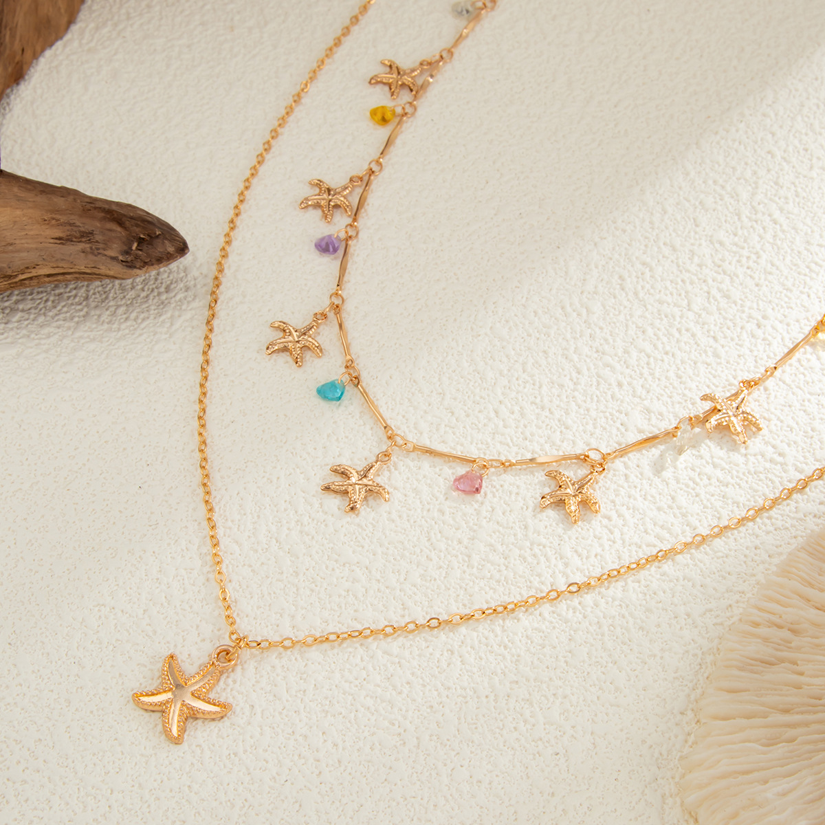 European and American cross-border jewelry: cold style diamond-encrusted cross tassel necklace, personalized small fish and starfish pendant, collarbone chain Application Scenario
