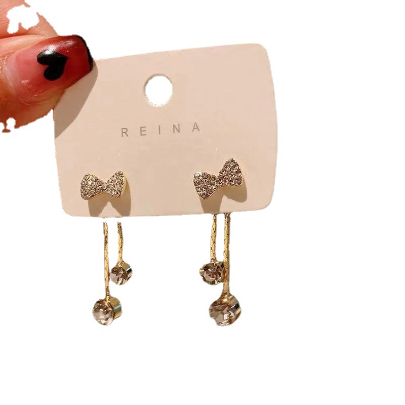 The new 925 silver needle bow star tassel stud earrings from Dongdaemun, South Korea, are fashionable, light luxury and versatile earrings for women Item Picture
