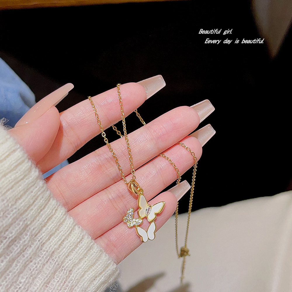 The popular titanium steel necklace for women, with a light luxury style and a high-end feel, is a niche and versatile piece. Zircon pendant and sweet butterfly collarbone chain details Picture