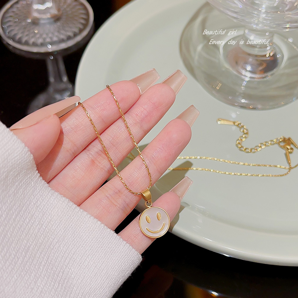 High-end, niche and cute smiley face pendant, hip-hop and simple titanium steel sweater chain, fashionable cross-border couple accessories Application Scenario