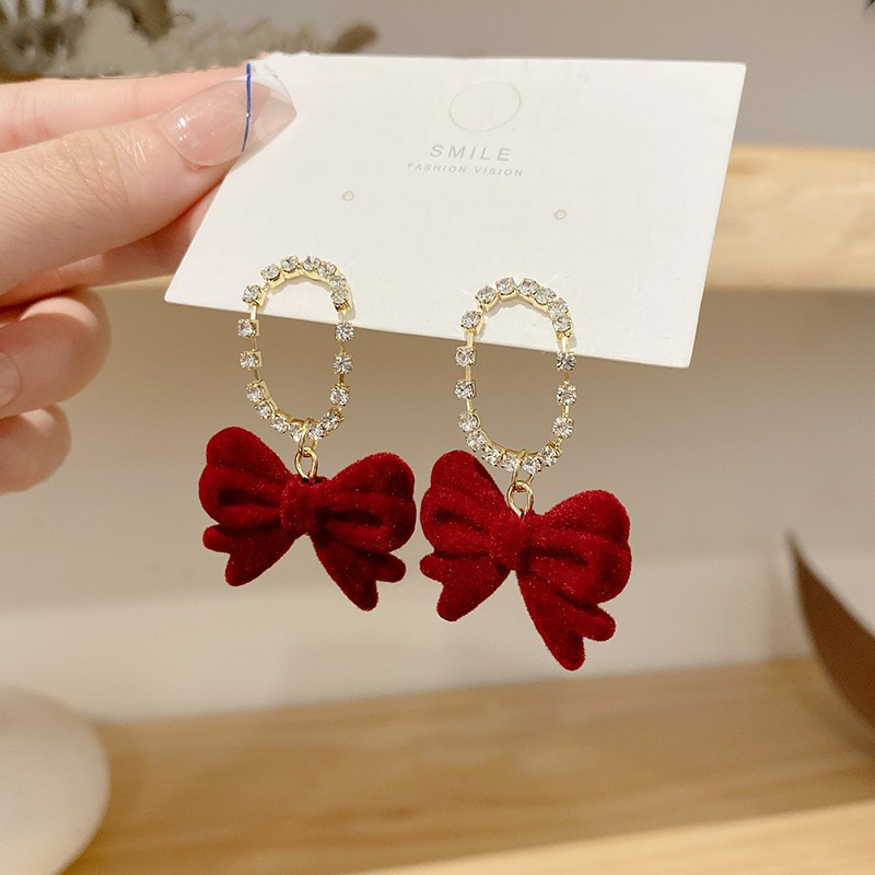 Autumn and winter flocked bow red earrings for women, a new style in 2025, suitable for the Spring Festival earrings, elegant New Year earrings details Picture