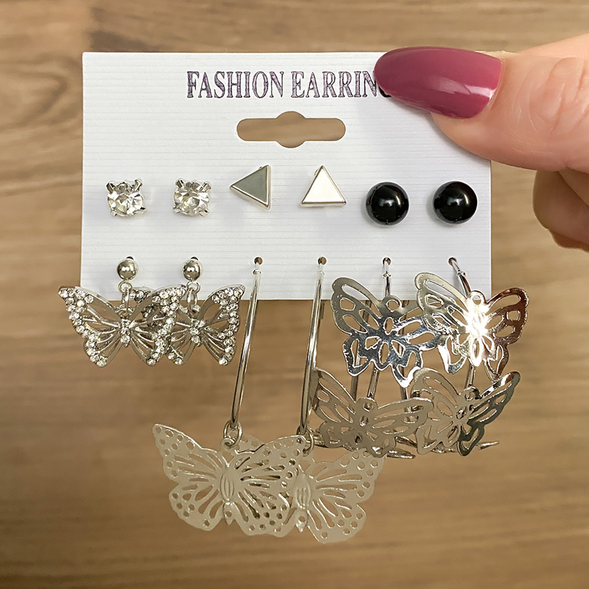 Wholesale set of 34-pair geometric diamond-encrusted earrings and creative hollowed-out butterfly earrings from cross-border Amazon in Europe and America details Picture