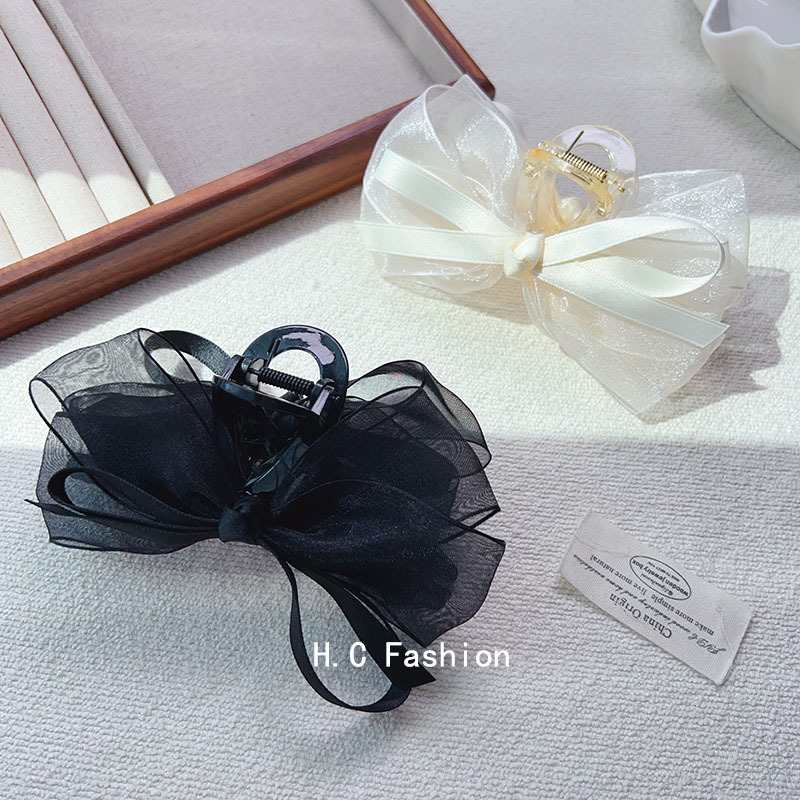 Korean mesh bow clip for women's hair, large volume hair clip headwear, high-end and elegant shark clip at the back of the head Application Scenario