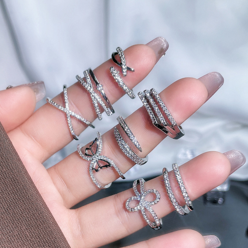 This niche design with slightly inlaid lines and a simple open ring is a versatile and stylish accessory for women. It can be worn in layers and exudes a cool and trendy vibe details Picture