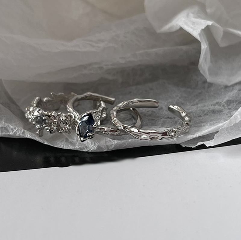 A niche design with an irregular texture and an open ring for women. A blue zircon sweet and cool style with a simple and unique personality Application Scenario