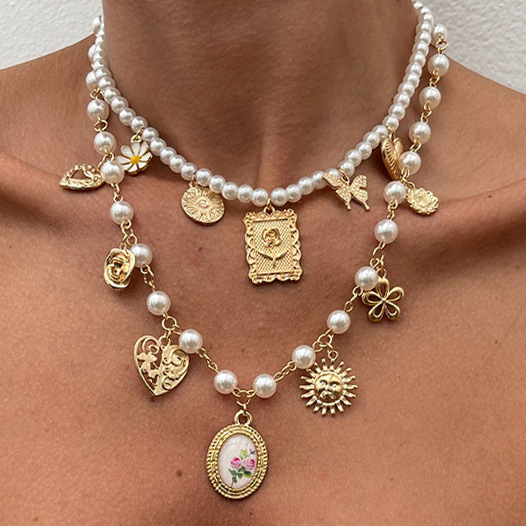 European and American cross-border jewelry, vacation style butterfly sunflower alloy necklace, sexy hot girl pearl beaded collarbone chain details Picture