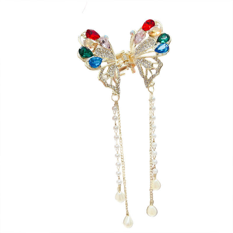 A new exquisite and niche female half-tied hair clip with a shark clip on the back of the head, featuring a butterfly pearl tassel Item Picture